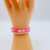 Colorful pink and white bracelets