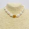 Collana in oro bianco con conchiglia di cowrie