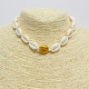 White gold cowrie shell necklace
