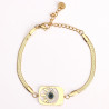 Brazalete de acero inoxidable chapado en oro con ojo