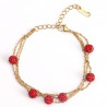 Pulsera de acero inoxidable chapado en oro con brillantes rojos