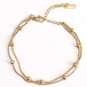 Bracelet acier inoxydable doré doublé à perles